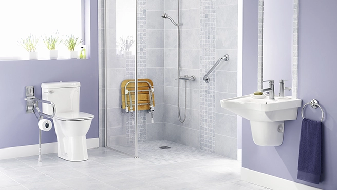 Renovated contemporary bathroom with safety and mobility upgrades.