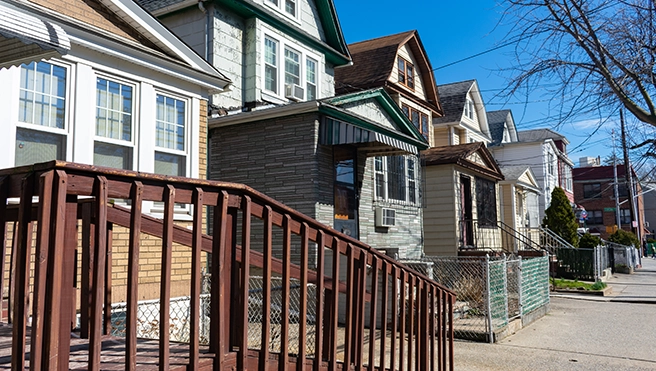 Row of diverse colorful residential houses.