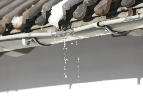 Damaged and sagging rain gutter in need of repair