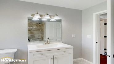 Bright bathroom featuring a modern white vanity.