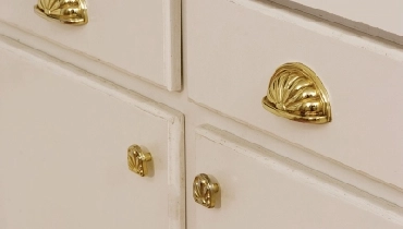 Gold cabinet hardware.