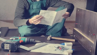 Homeowner struggling with confusing furniture assembly instructions.